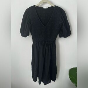 Gap. Black v neck shocked bodice dress with puffy sleeves. Size XS.